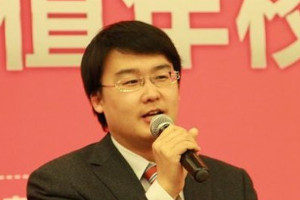 Gao Erji, executive president of Caixin Insight.